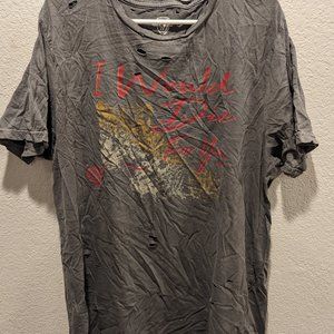 Oversized and distressed graphic tee